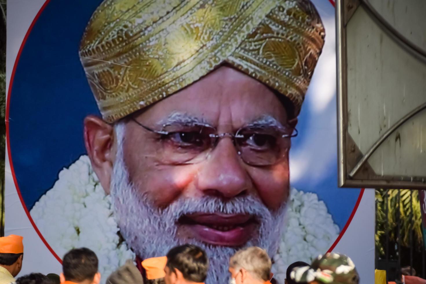 New Delhi, India - January 16 2023 - Prime Minister Narendra Modi cut out during BJP road show, the statue of PM Modi while attending a big election rally in the capital photo