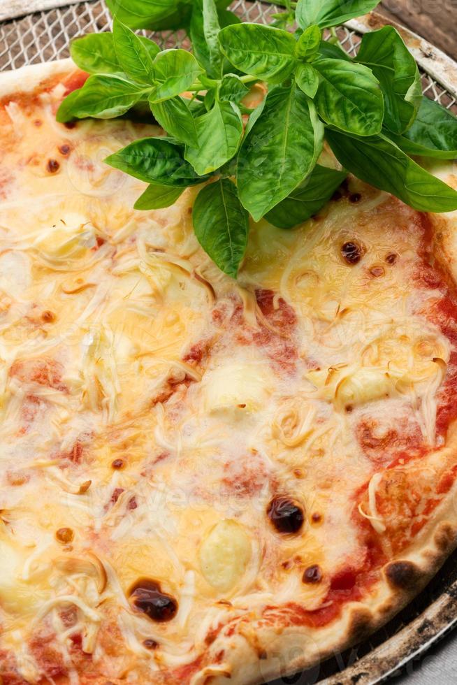 Delicious pizza close-up photo