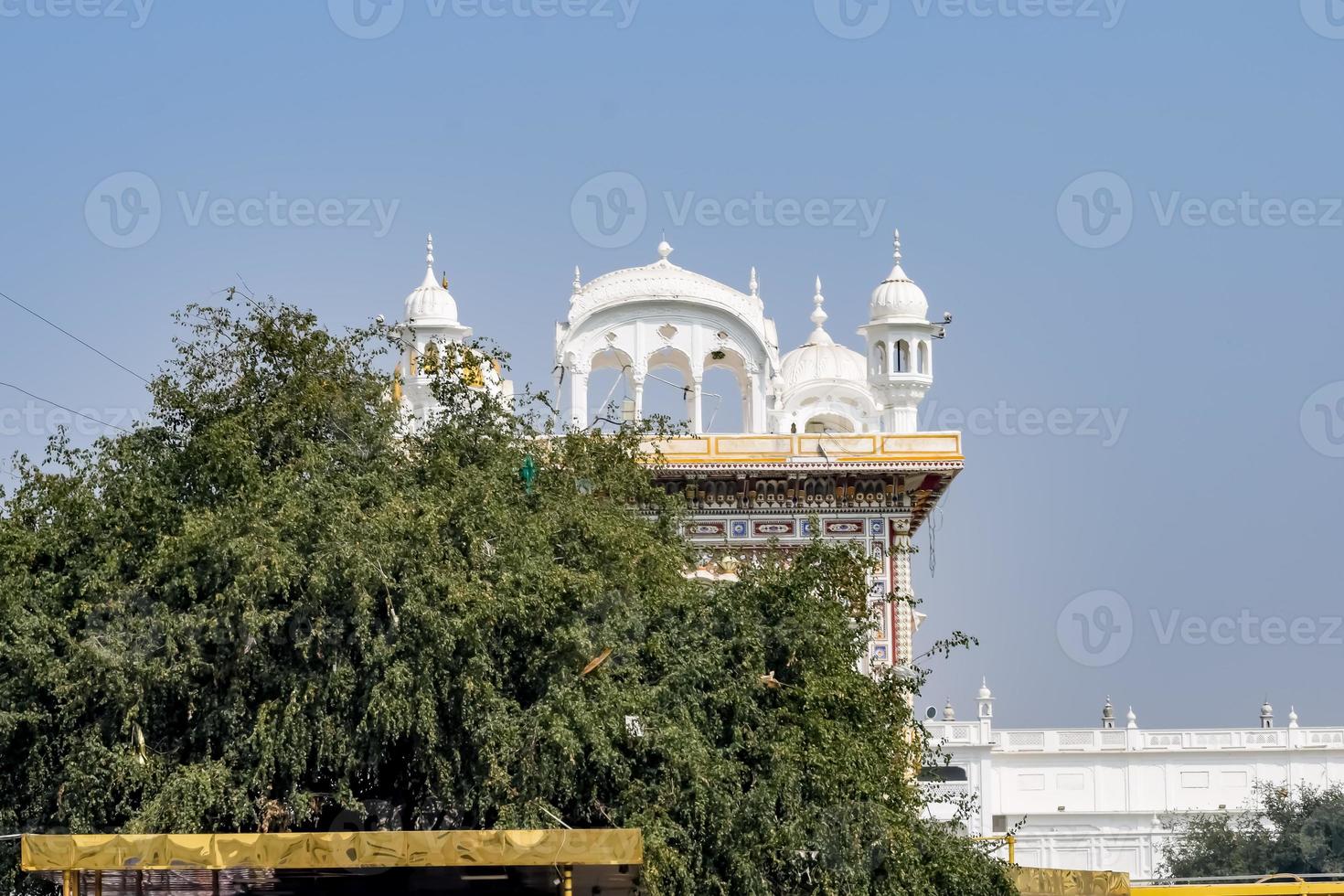 View of details of architecture inside Golden Temple - Harmandir Sahib in Amritsar, Punjab, India, Famous indian sikh landmark, Golden Temple, the main sanctuary of Sikhs in Amritsar, India photo