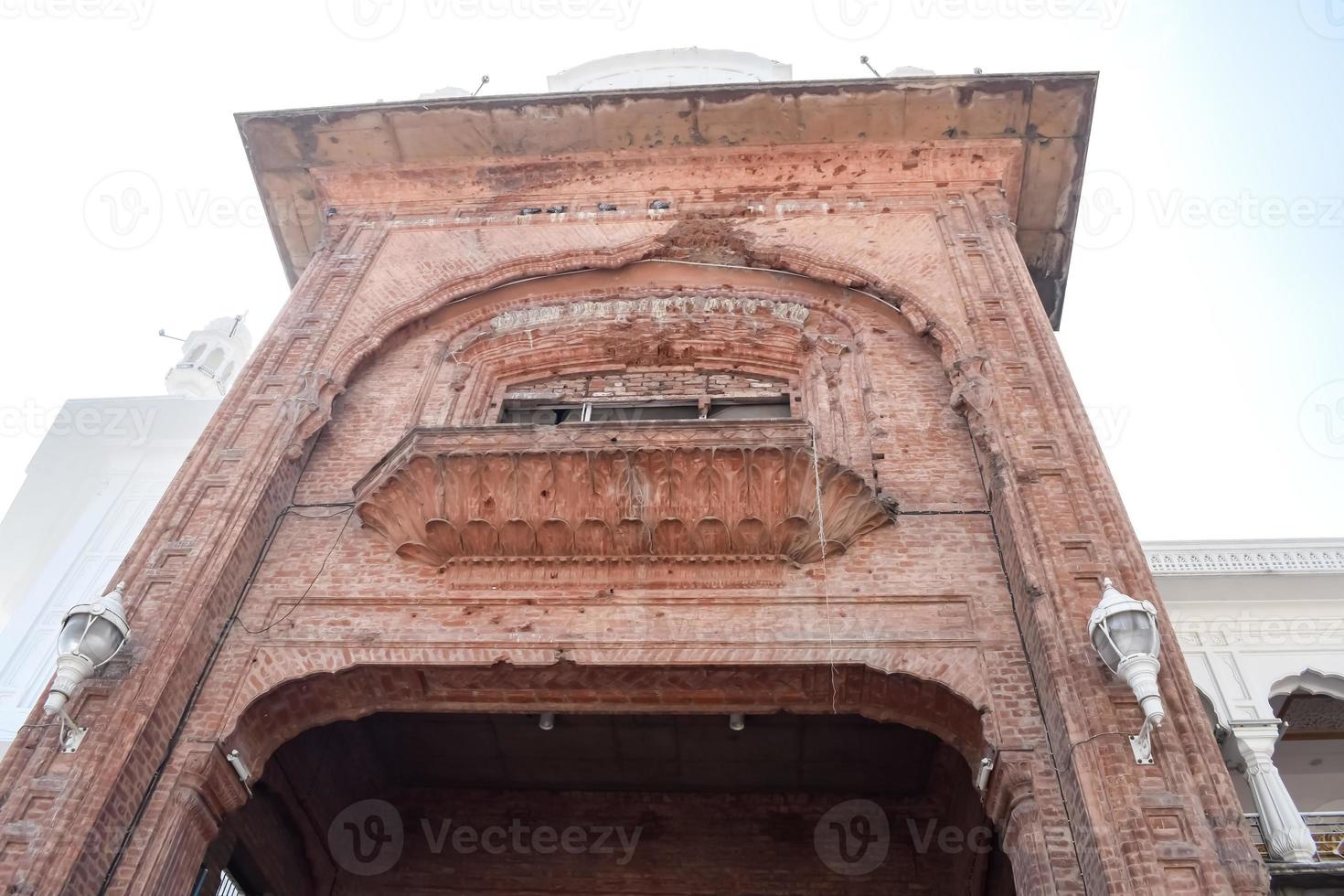 View of details of architecture inside Golden Temple - Harmandir Sahib in Amritsar, Punjab, India, Famous indian sikh landmark, Golden Temple, the main sanctuary of Sikhs in Amritsar, India photo