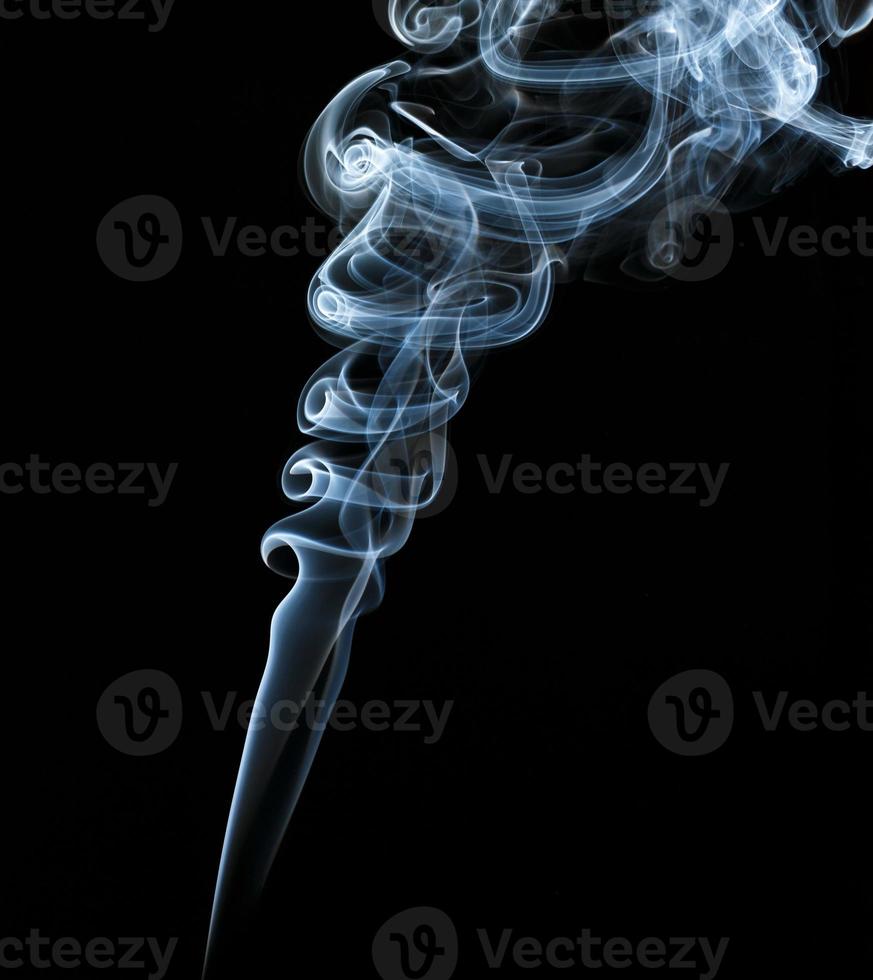 Abstract light smoke on a black background photo