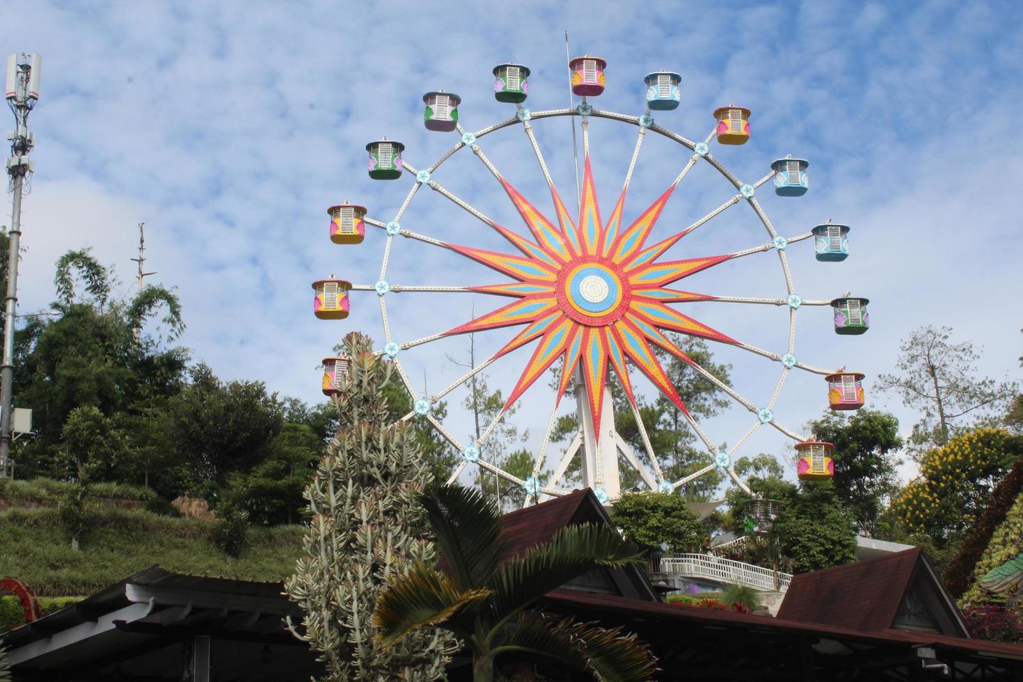 A FERRISWHEEL IN A PLAYGROUND - Malang - 18.02.2023 photo