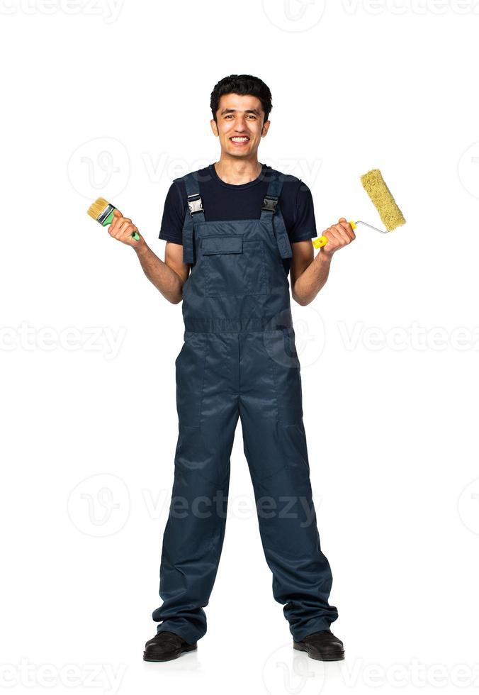 Repairman Arab nationality in the construction overalls on a white background photo