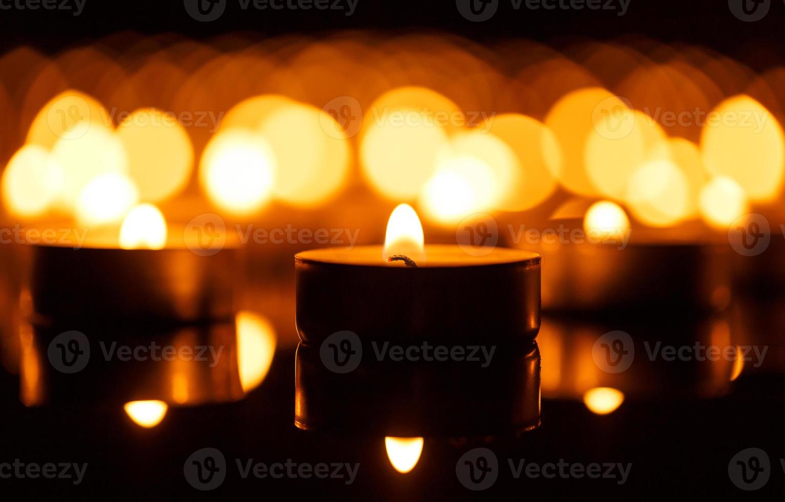 Burning candles with shallow depth of field photo