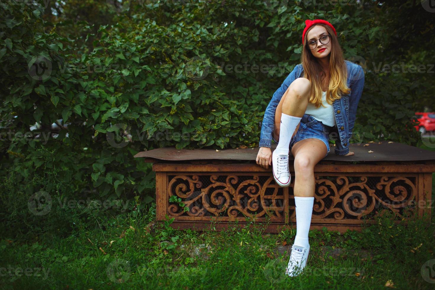 Young modern woman outdoors photo
