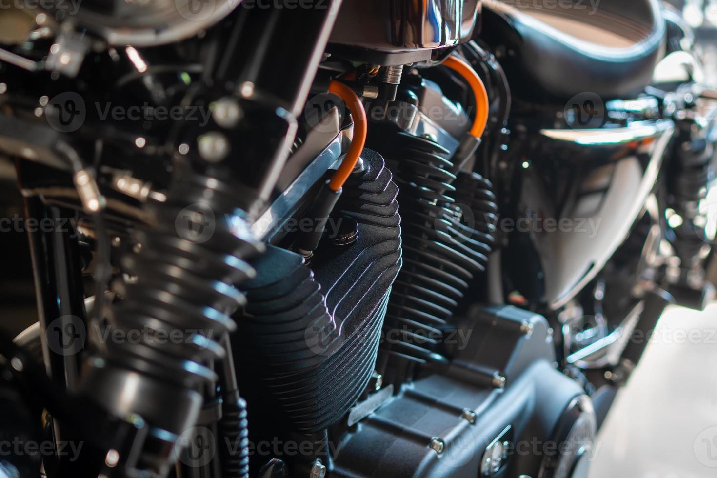 Engine block of a vintage motorcycle. it's a nice and beautiful looking motorcycle ,parked up for show in Classic Motorcycle Shops ,selective focus photo