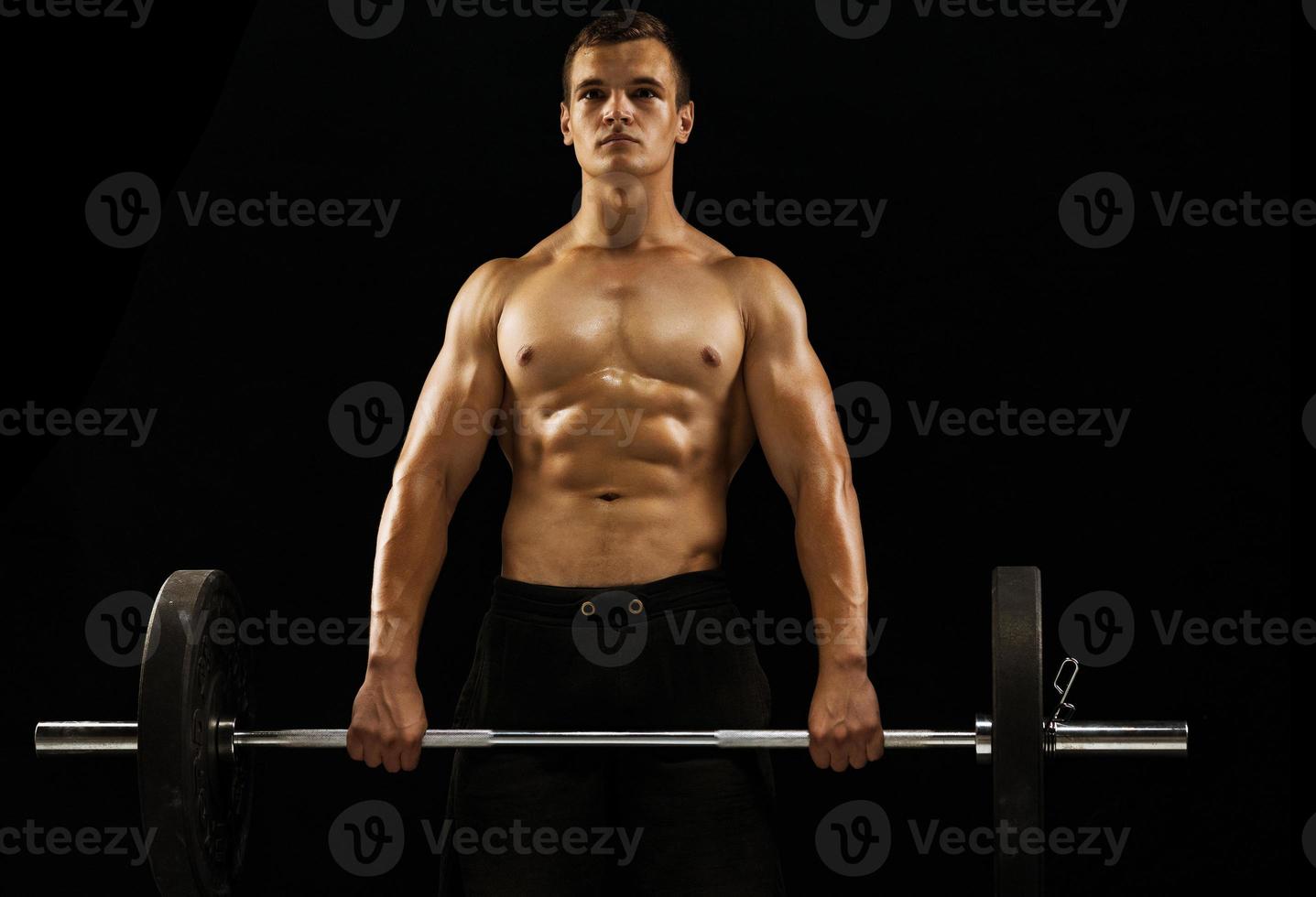 Man working out at the gym photo