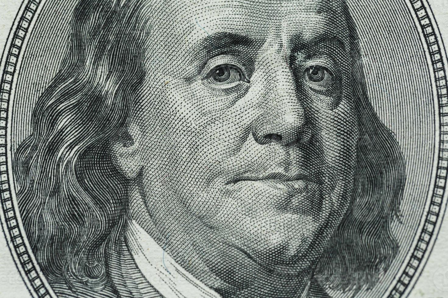 Benjamin Franklin's portrait on one hundred dollar bill photo
