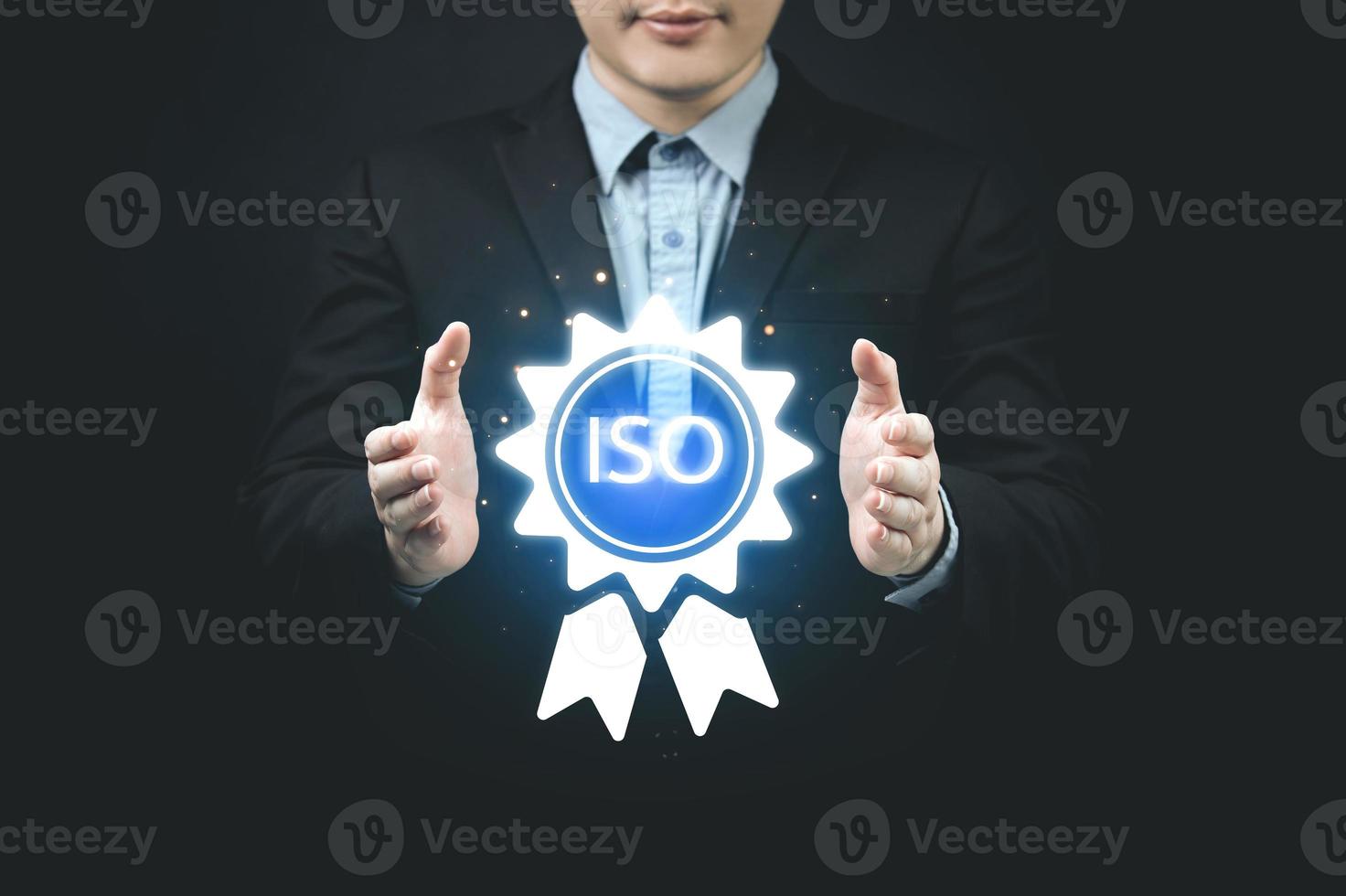 ISO Standard concept. Quality Control, Assurance Terms Check. Businessman showing digital certificate symbol of certification process and setting business standards that meet international standards photo
