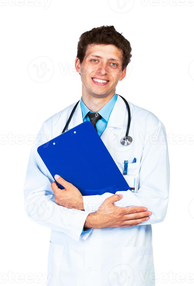 Portrait of a smiling male doctor holding a notepad on white photo
