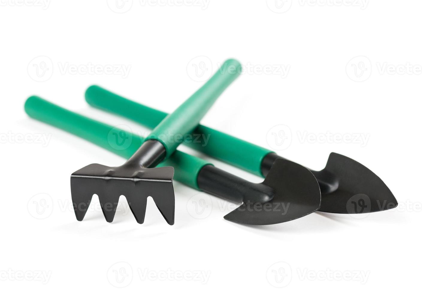 Gardening tools on white background photo