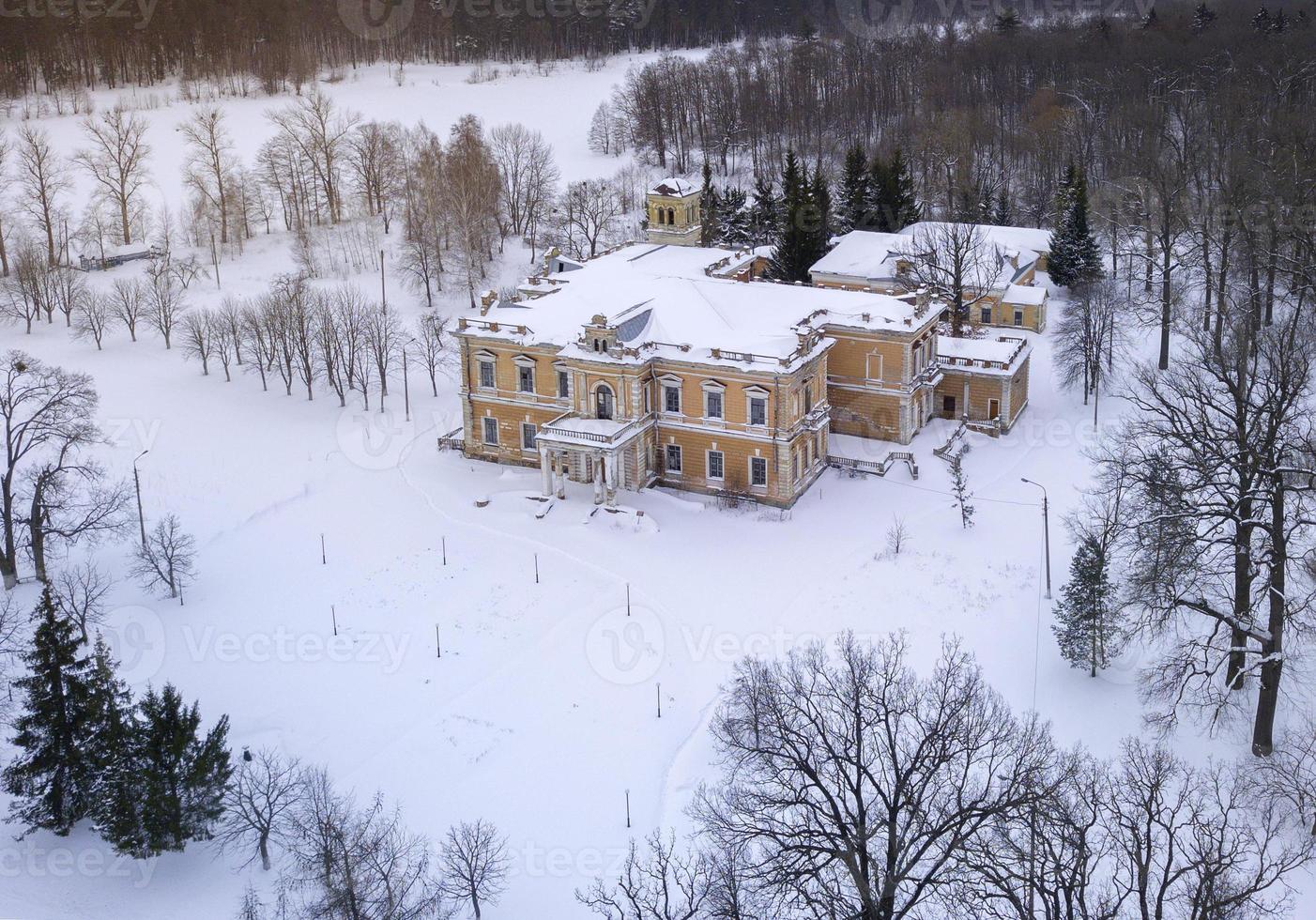 Aerial view of the old abandoned estate in the desert winter landscape photo