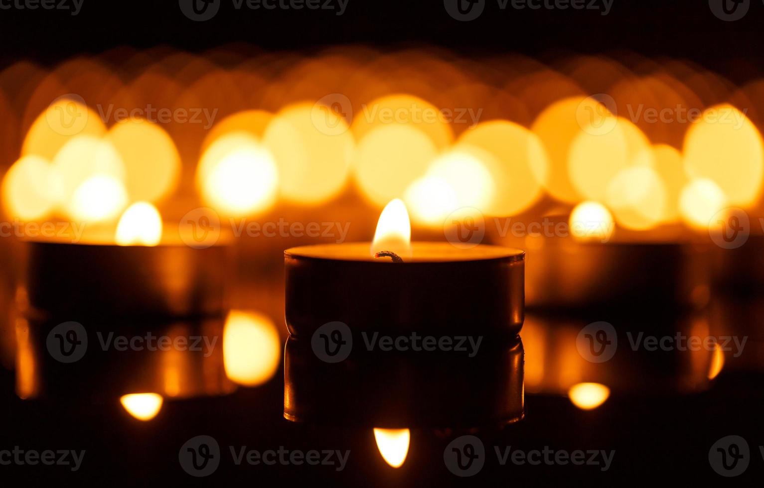 Burning candles with shallow depth of field photo