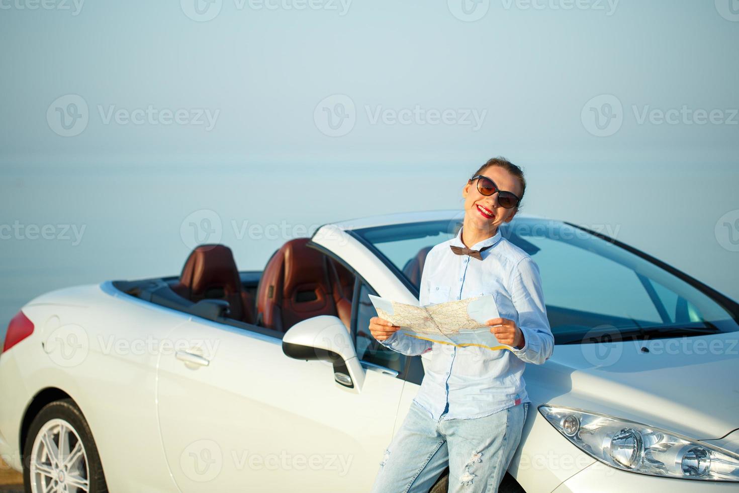 Young woman with new car photo