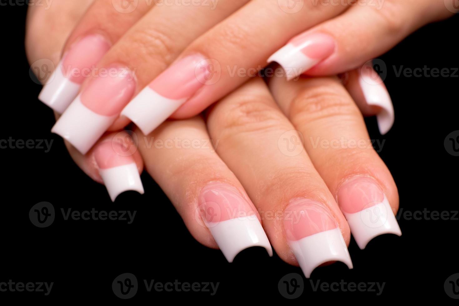 French manicure on Black background photo