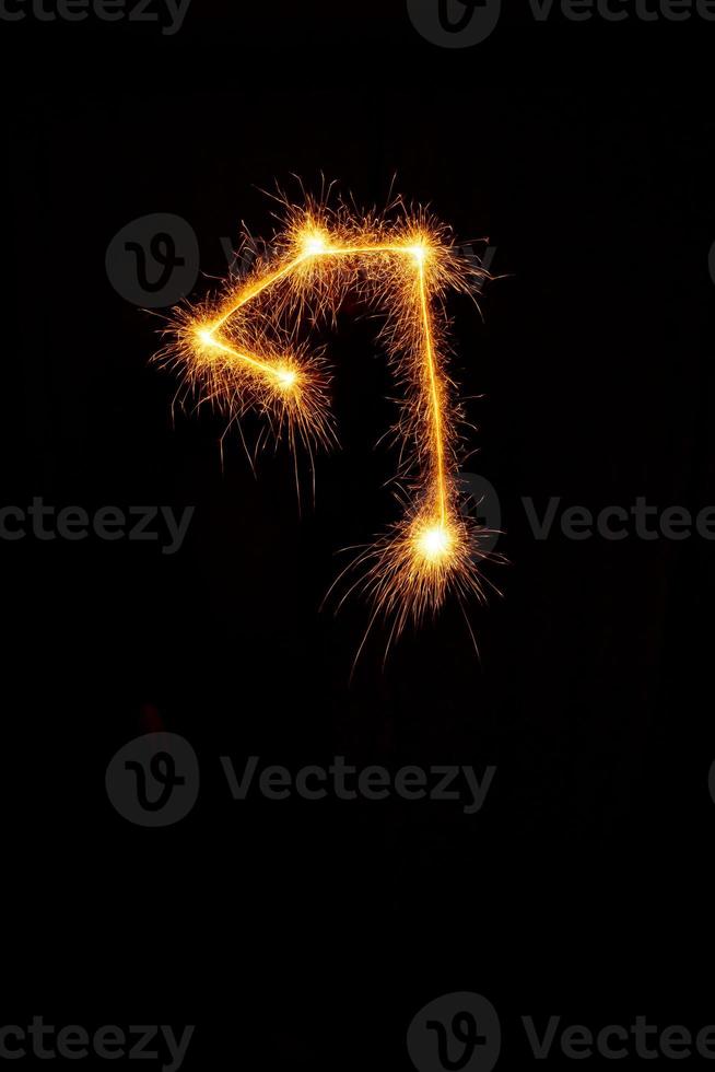 made with sAlphabet element made with sparklers ready for your inscriptions on black background photo