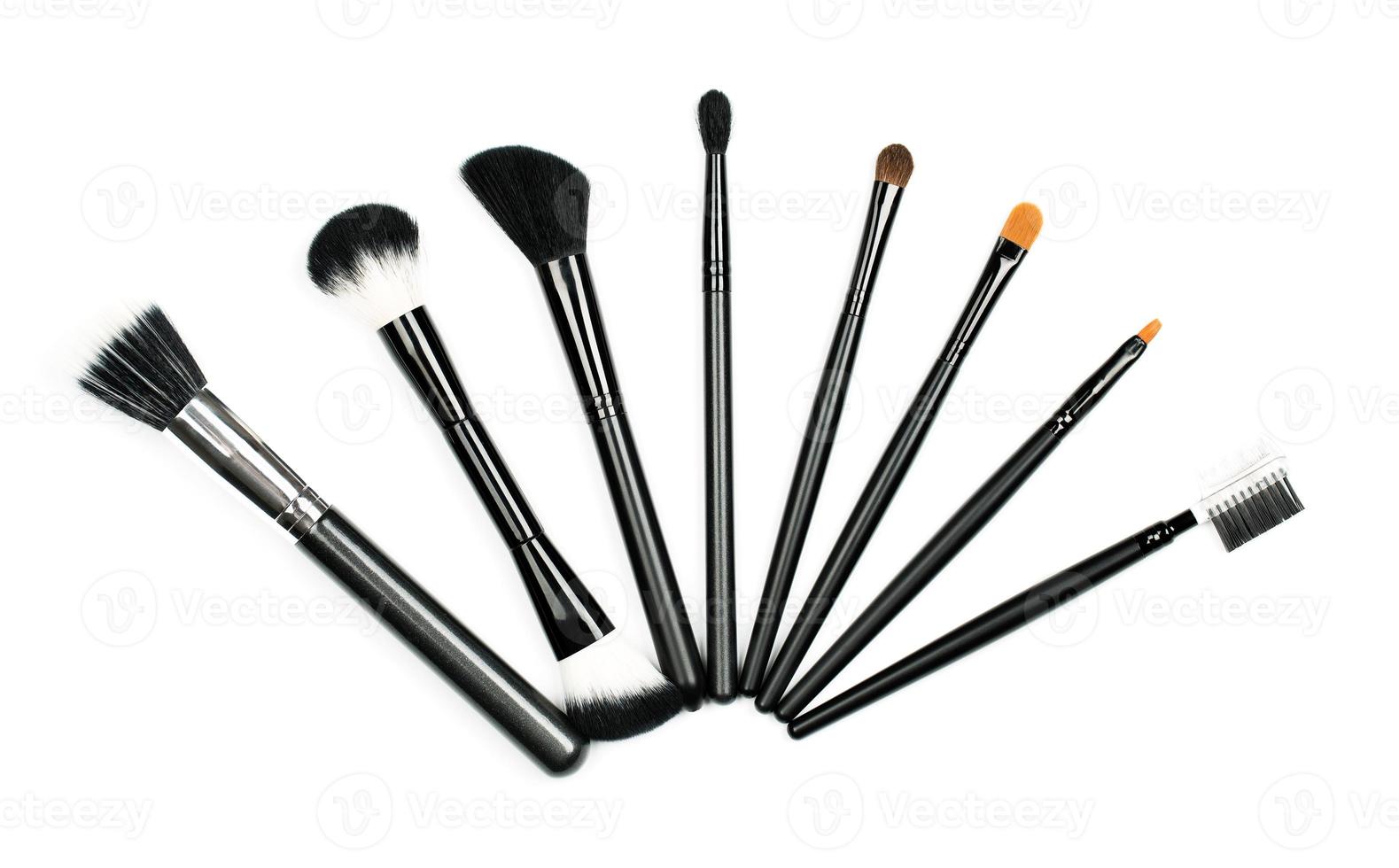 Professional makeup brush set on white photo