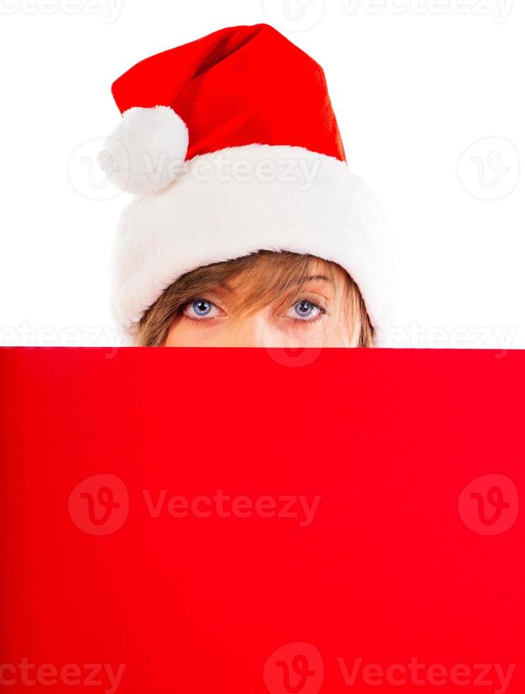 Christmas girl with red placard on white photo