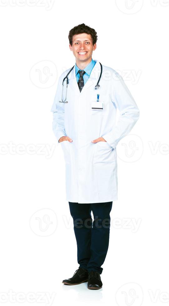 Full length portrait of the smiling doctor on a white photo