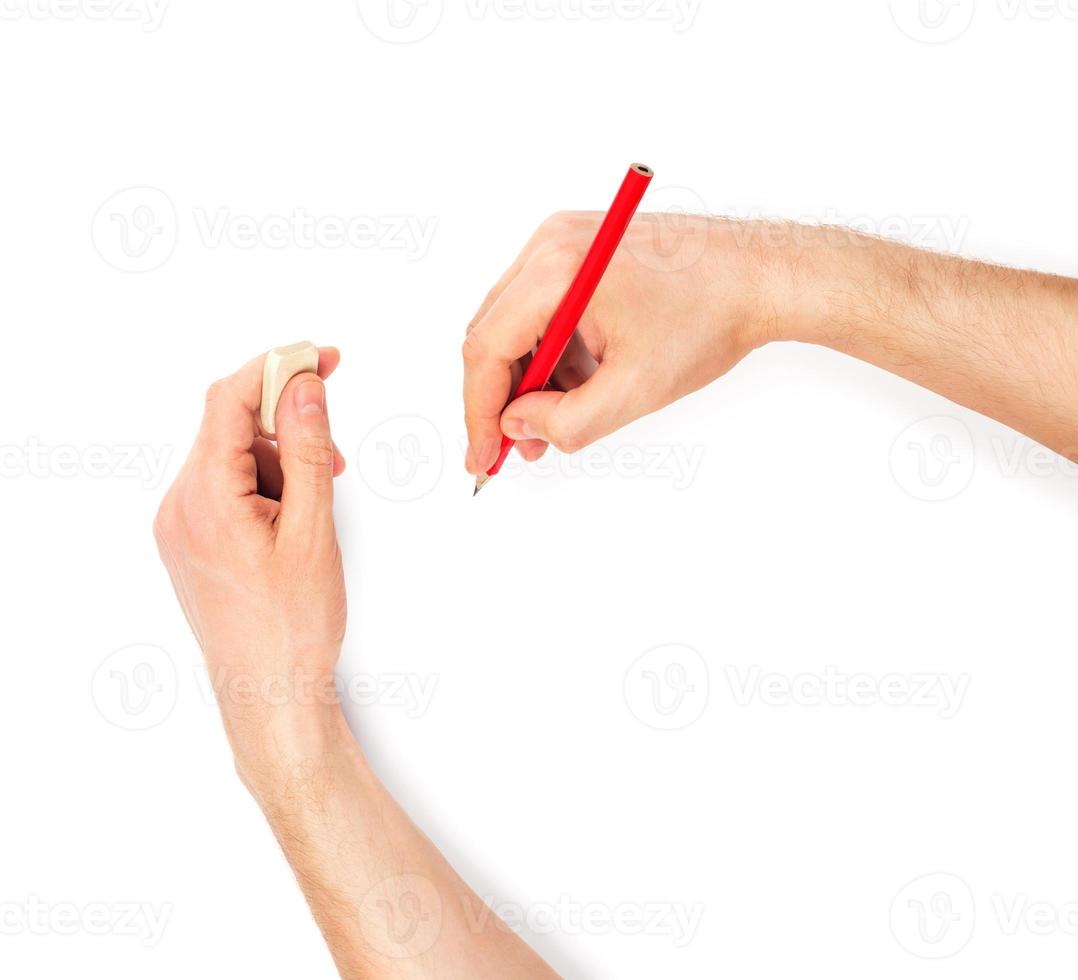 Human hands with pencil and erase rubber photo