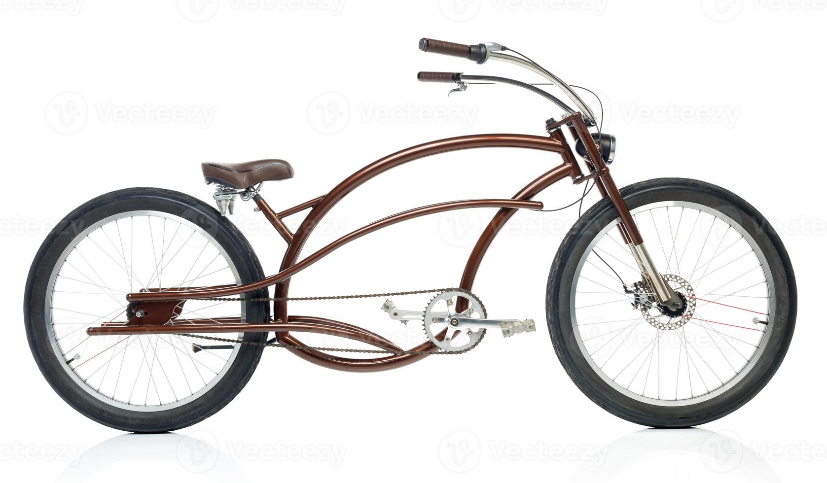 Retro styled brown bicycle isolated on a white photo