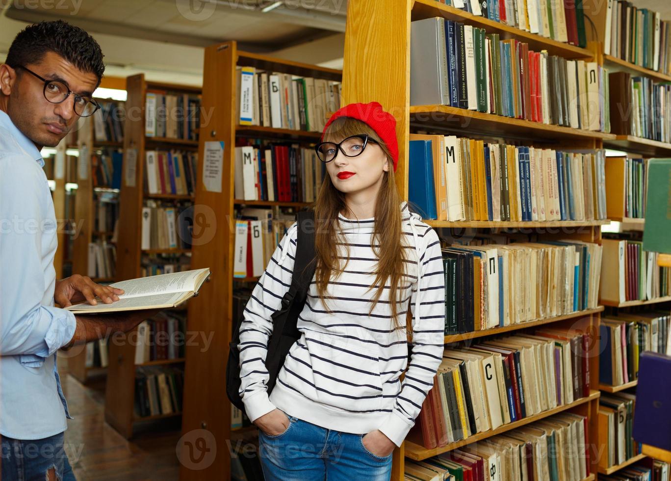 Young couple at the library photo