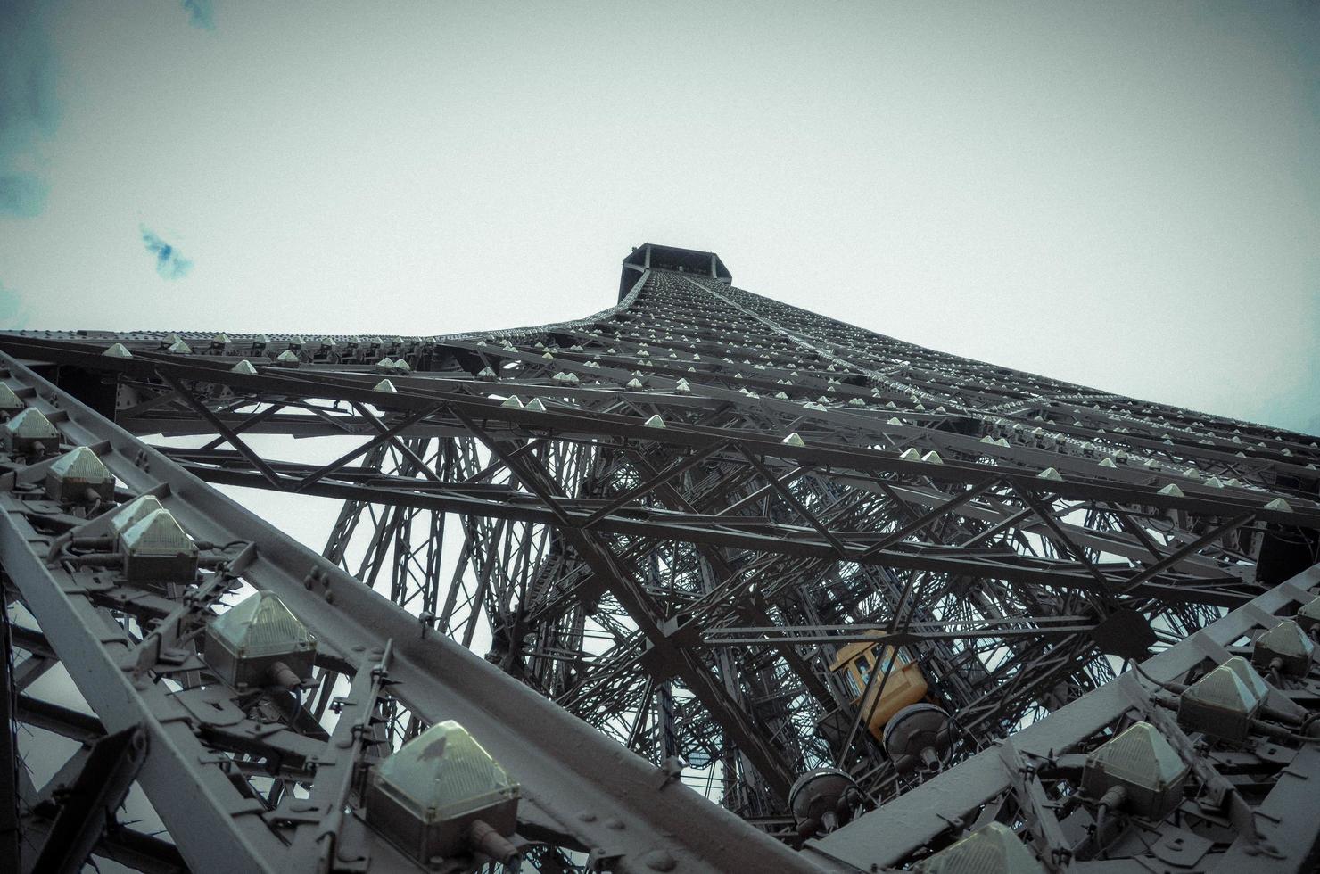 the tour eiffel photographed from below, on a summer day in 2012. The iron monument symbol of Paris, the capital of France photo