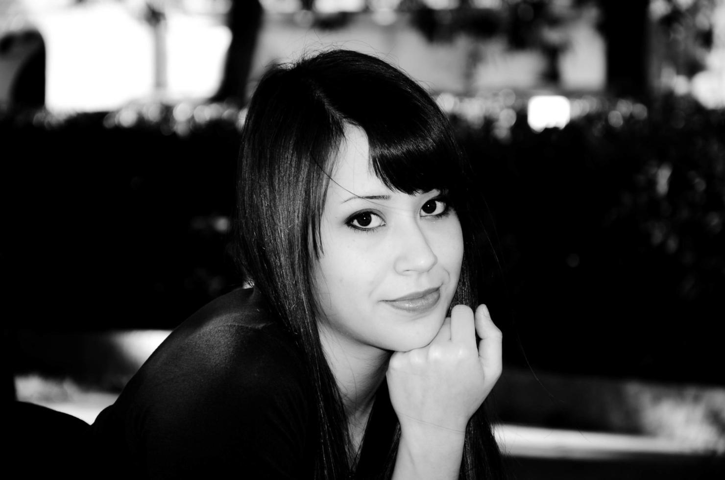 beautiful photographic portrait of a brunette girl in black and white. Photo shooting done in Liguria in the winter of 2012