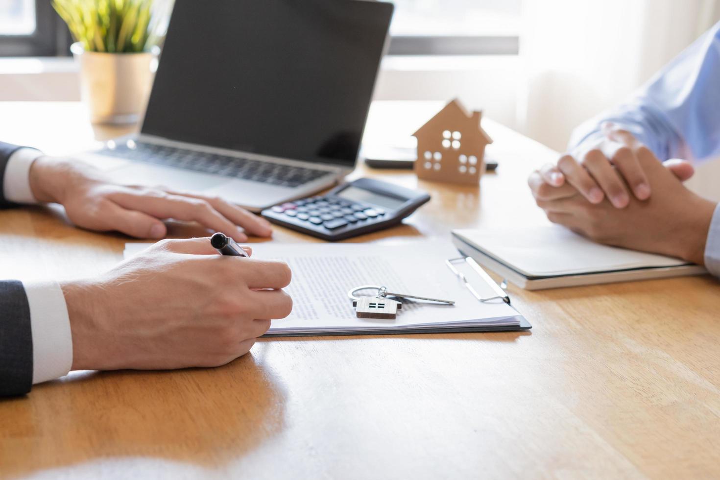 Asian tenant, client man sign signature contract rental purchase, buyer home or apartment with landlord, realtor after banker agreement mortgage, loan success or done. Property lease agent concept. photo