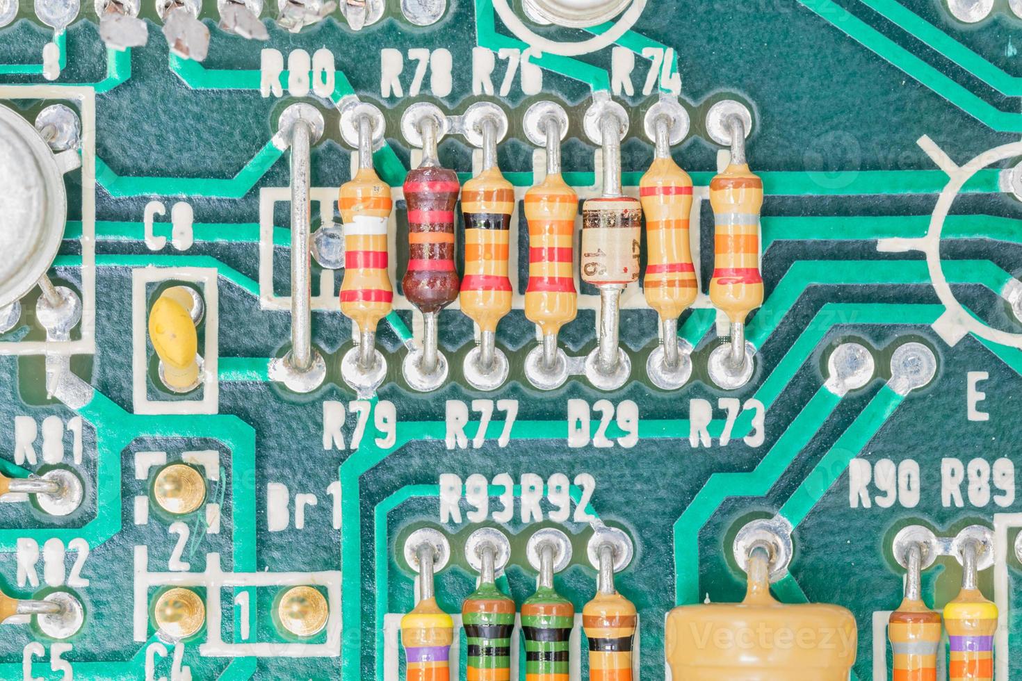 Condensers and Resistor assembly on the circuit board photo