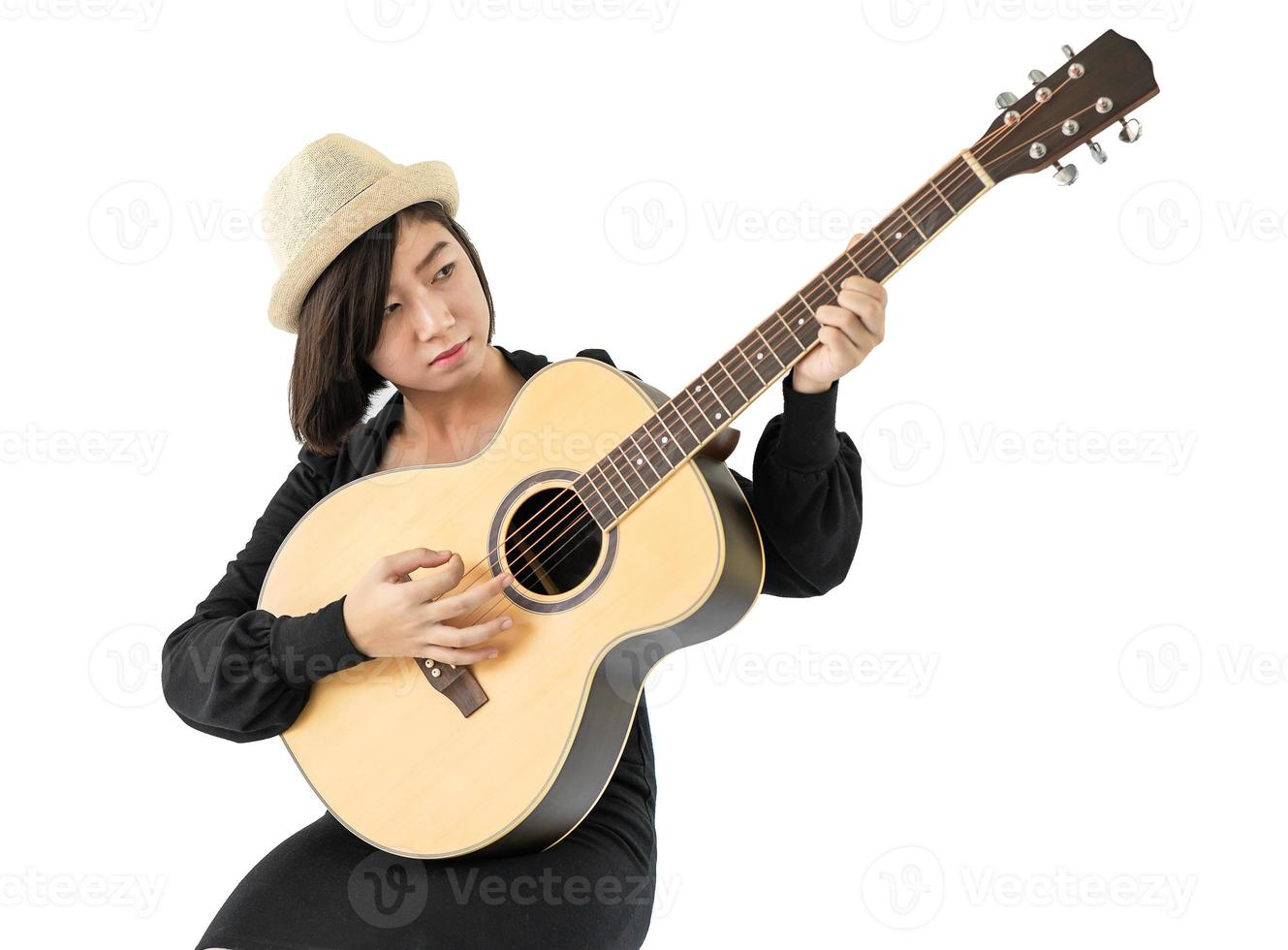 Woman hold guitar guitar folk song in her hand photo