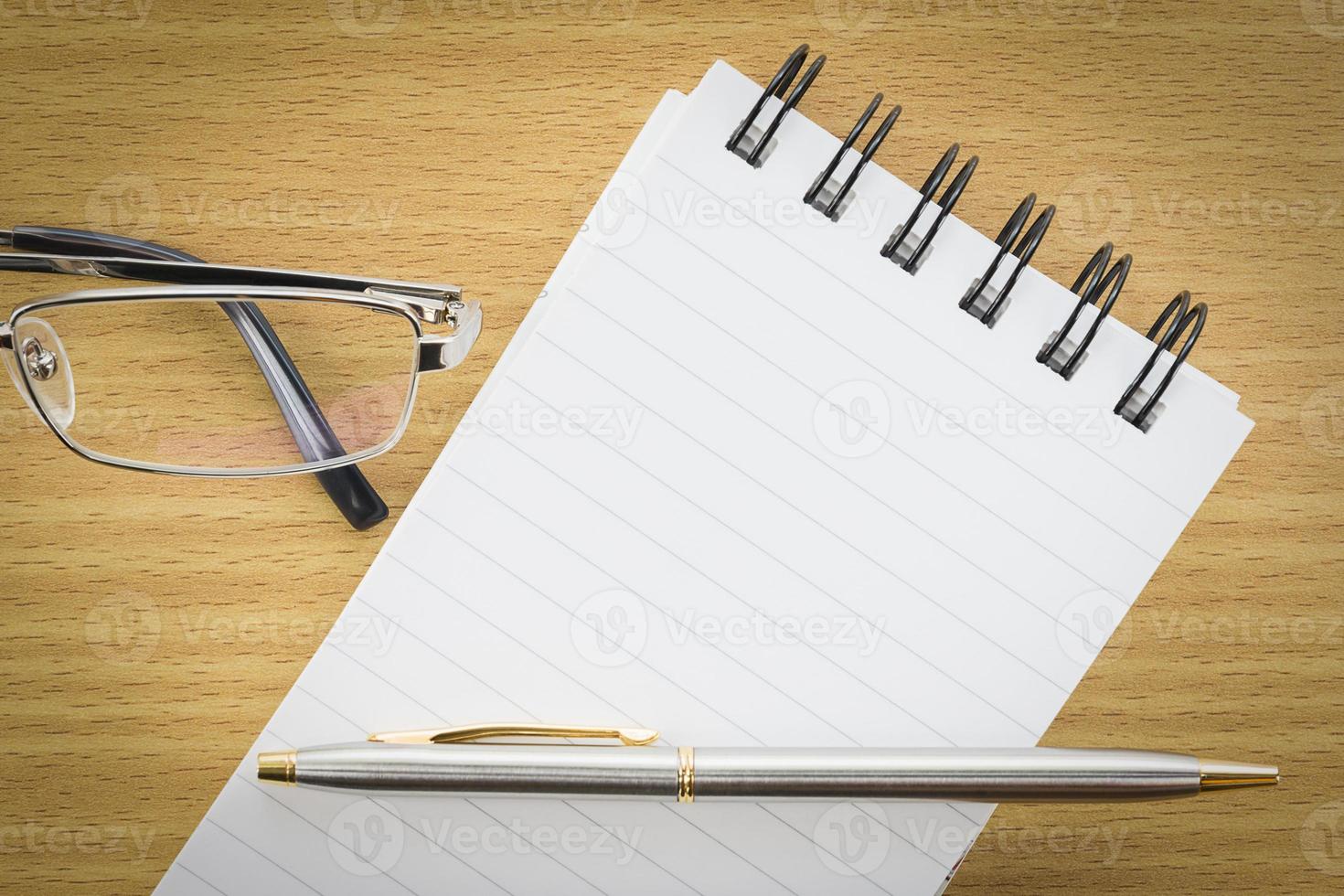 Notepad with blank page photo