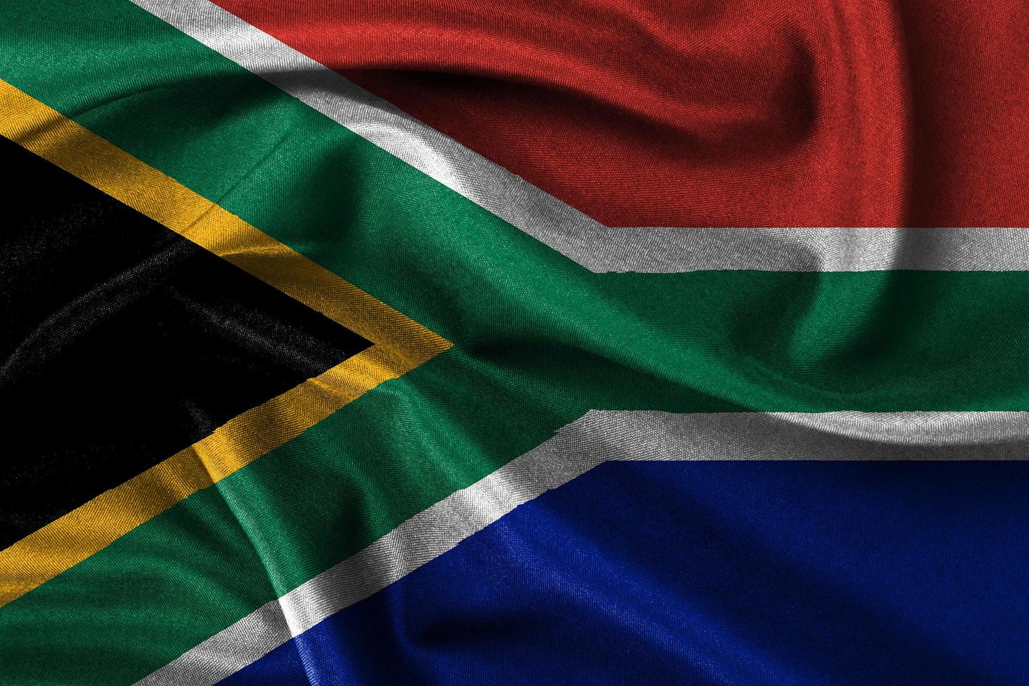 Fabric texture of Souyh Africa flag, Smooth wavy flag of South Africa, National of Africa Day celebration design photo