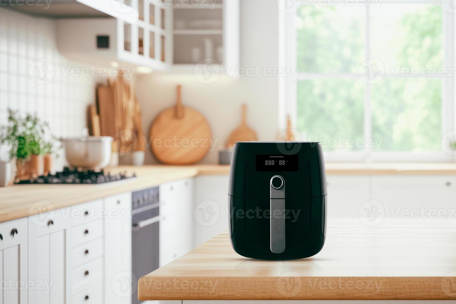 Air fryer machine cooking potato fried in kitchen. Lifestyle of new normal cooking. photo