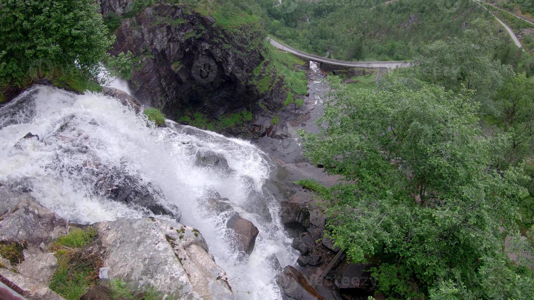 Waterfall in mountains. Outdoor nature in Norway photo