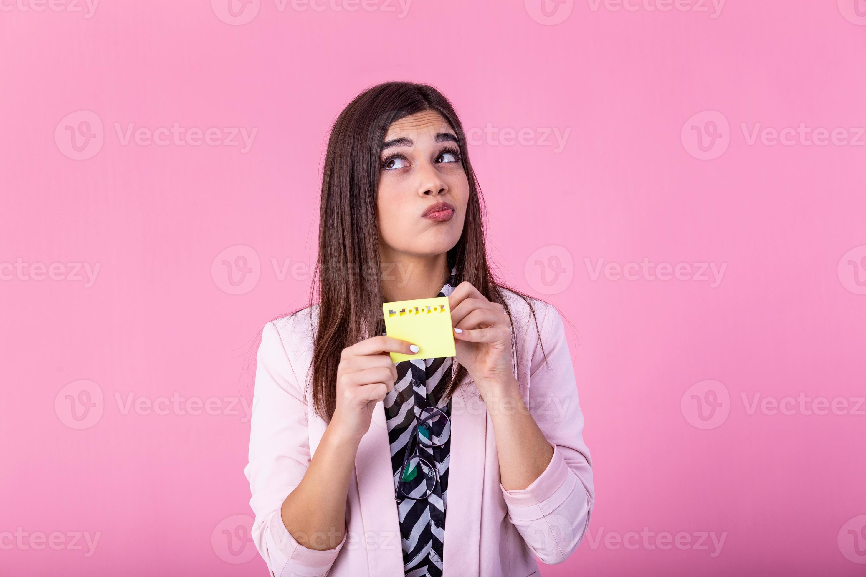 Young businesswoman with to do list sticky notes to do list personal