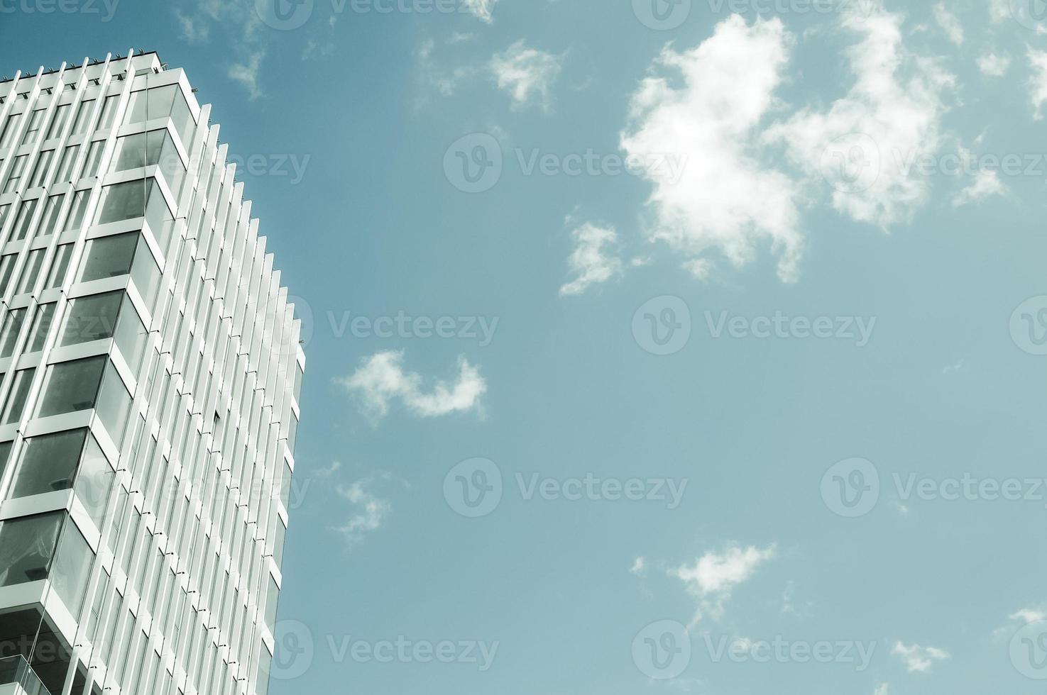 Modern multistory building ground view. Minimalist image of a building. photo