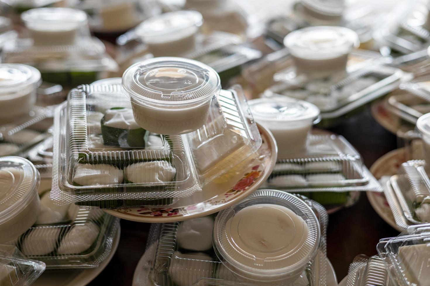 A large number of white coconut milk jelly desserts. photo