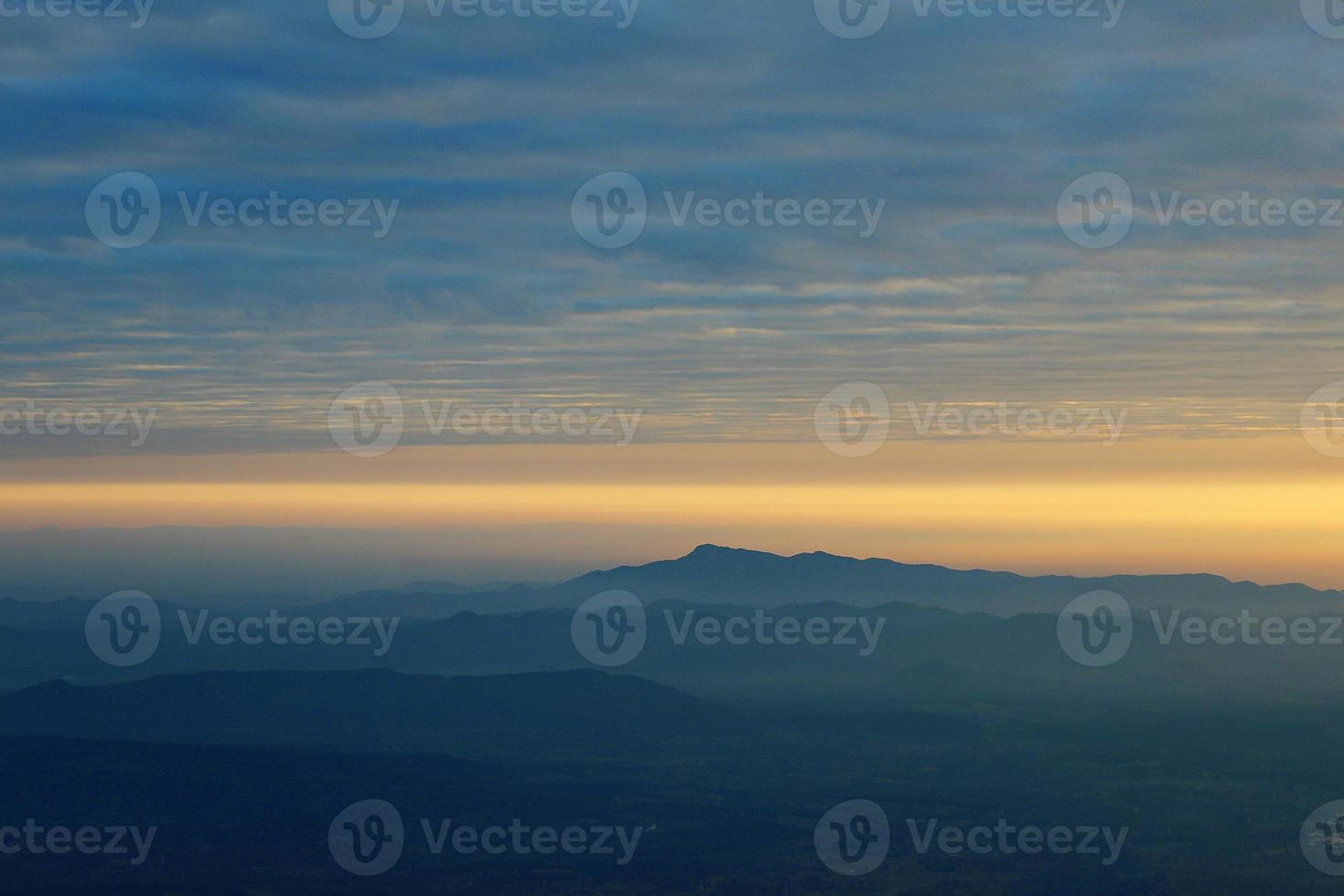 mountain at sunrise at view point at pha mak duk at phukradueng national park photo