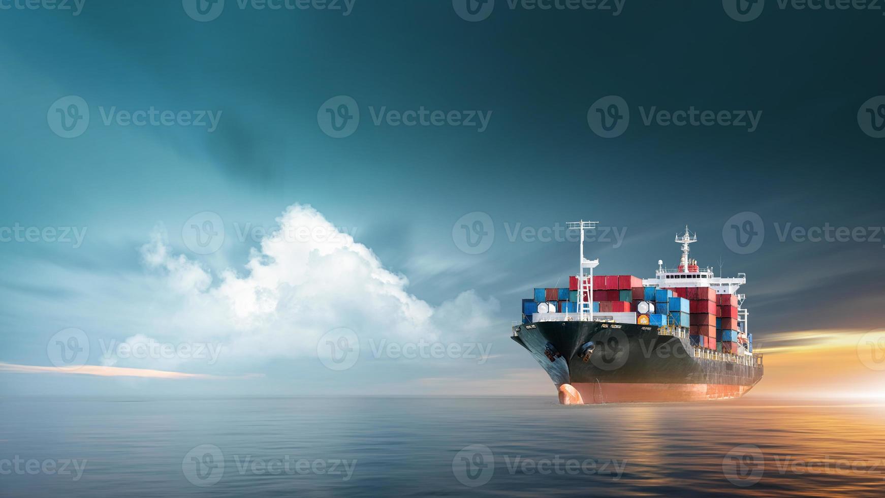 Container cargo ship in ocean at sunset dramatic sky background with copy space, Nautical vessel and sea freight shipping, International global business logistics transportation import export concept photo