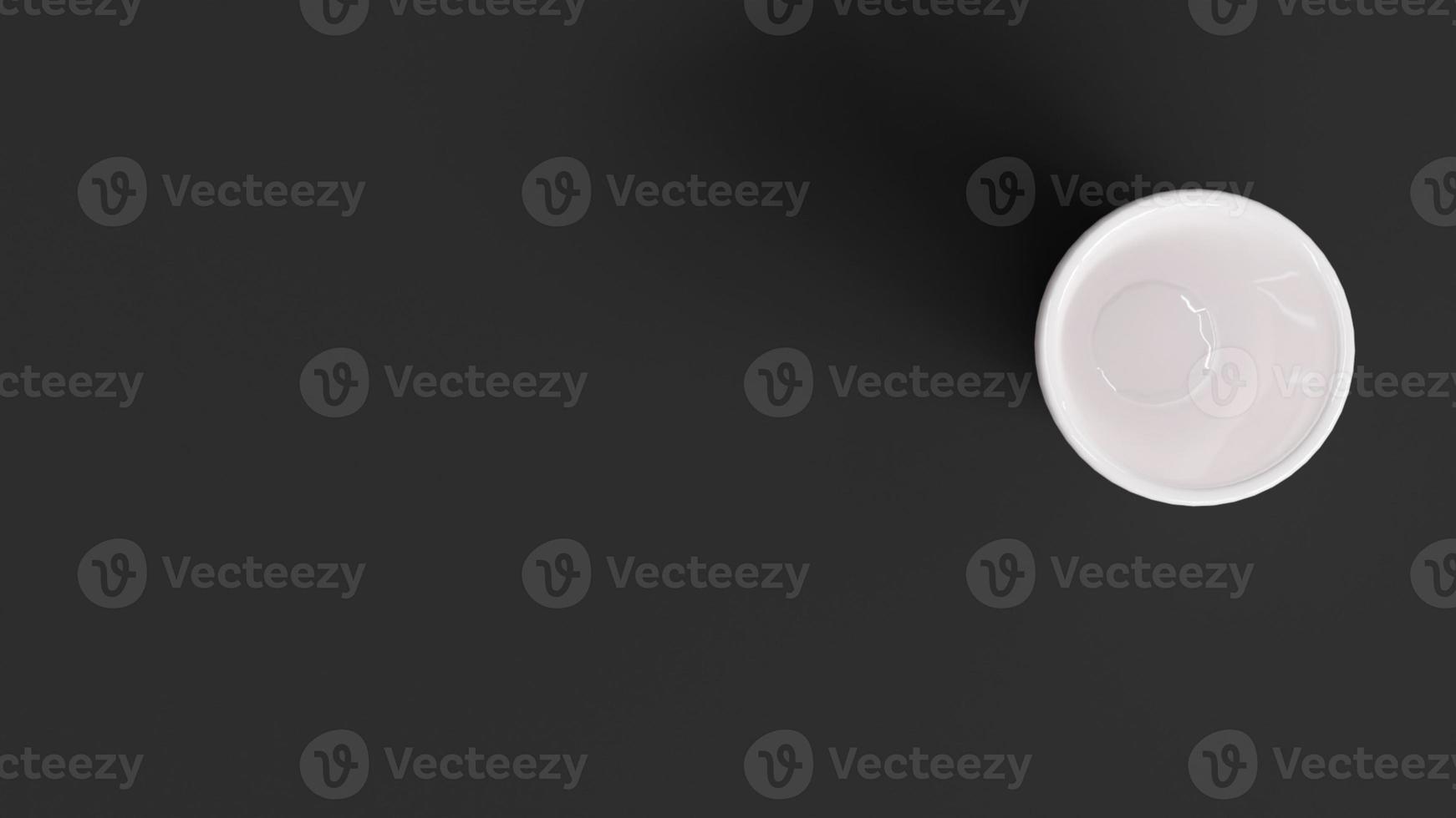 3d ceramic mug on black background, top view. Copy space. photo