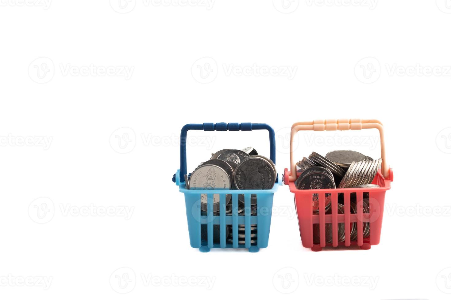 Basket of coins on white background.Finance, business concept, copy space. photo