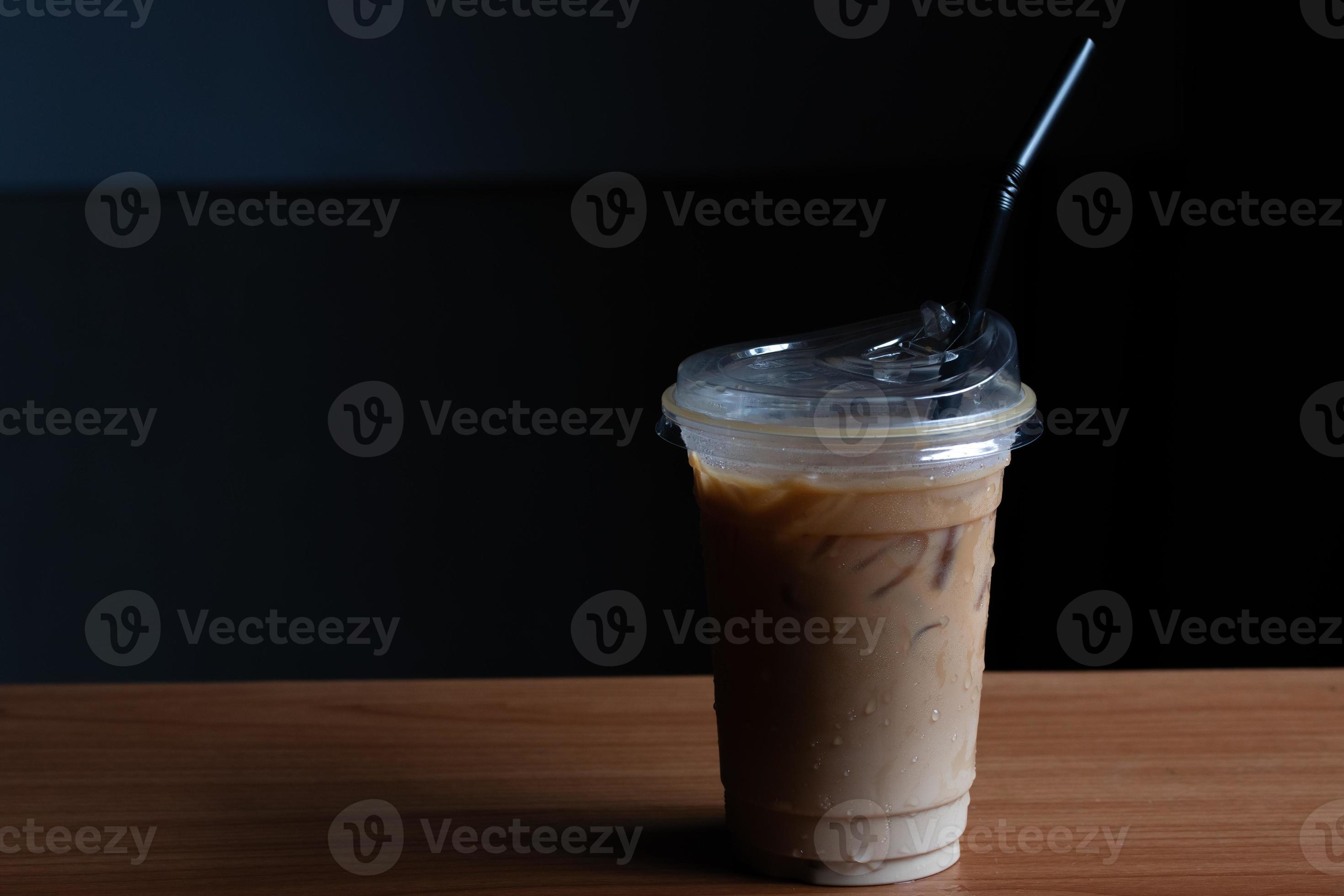 iced coffee in clear plastic cup 21163044 Stock Photo at Vecteezy