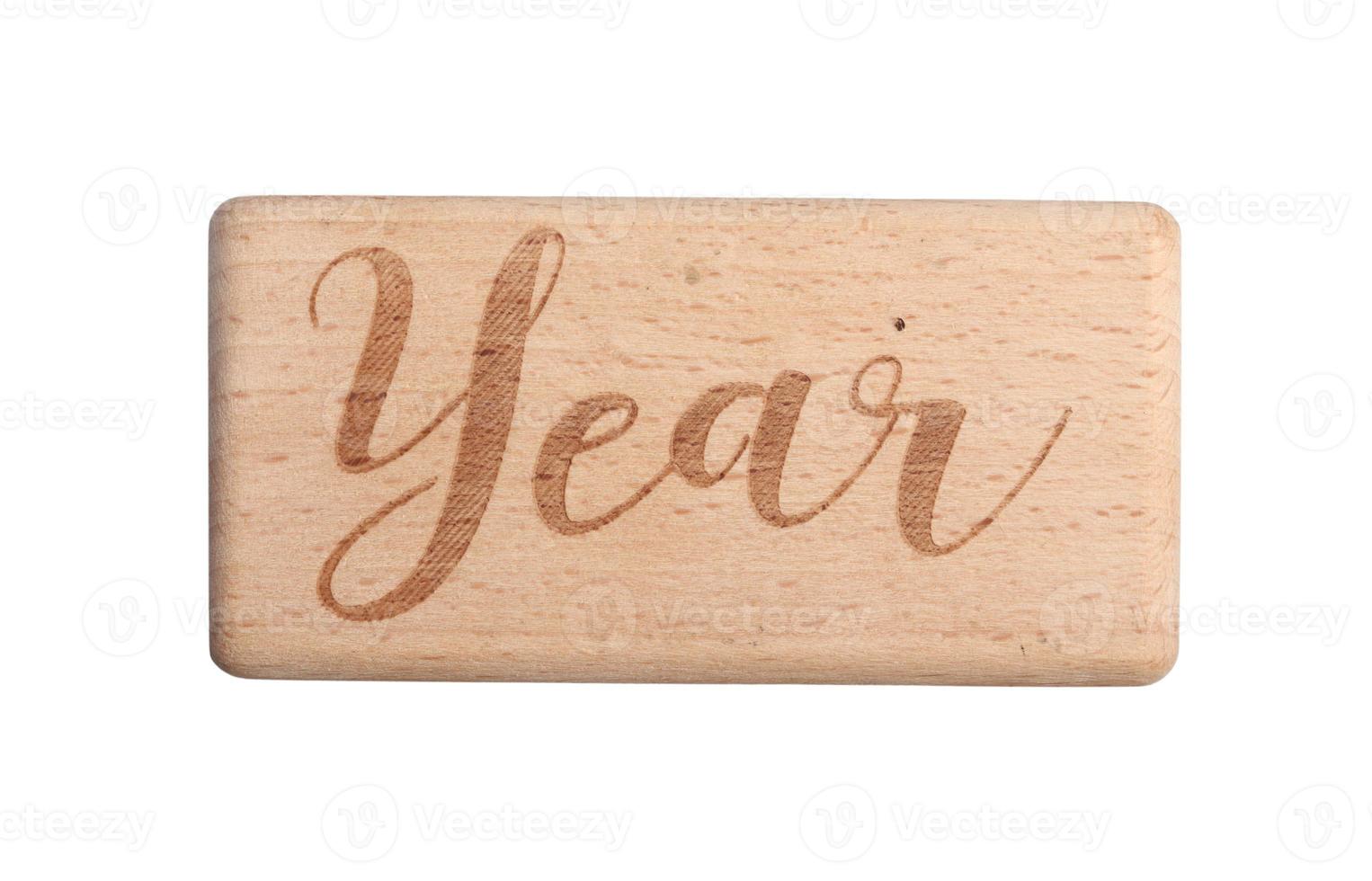 A wooden block showing the date of birth of a newborn child on a white background. photo