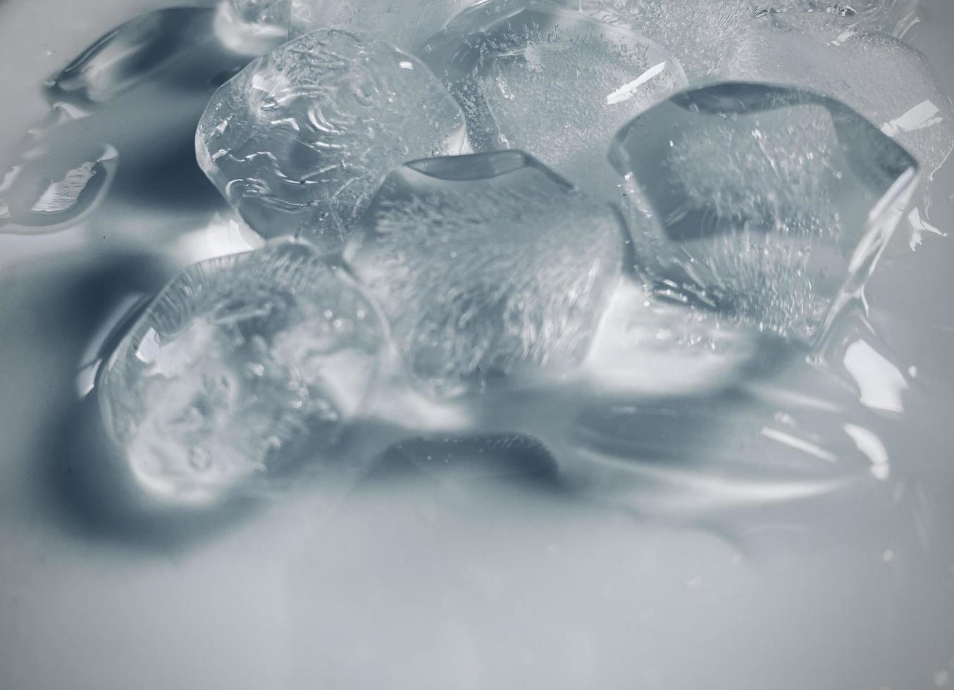 Ice cubes background, ice cube texture or background It makes me feel fresh and feel good, In the summer, ice and cold drinks will make us feel relaxed, Made for beverage or refreshment business. photo