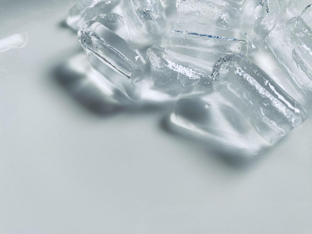 Ice cubes background, ice cube texture or background It makes me feel fresh and feel good, In the summer, ice and cold drinks will make us feel relaxed, Made for beverage or refreshment business. photo