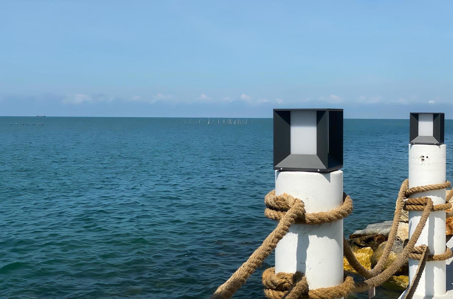 Piers in seaside resorts look luxurious, and suitable for relaxation. Suitable for tourists to enjoy the beauty of the sea. Makes you feel relaxed and calm, just come to relax at the sea during summer photo