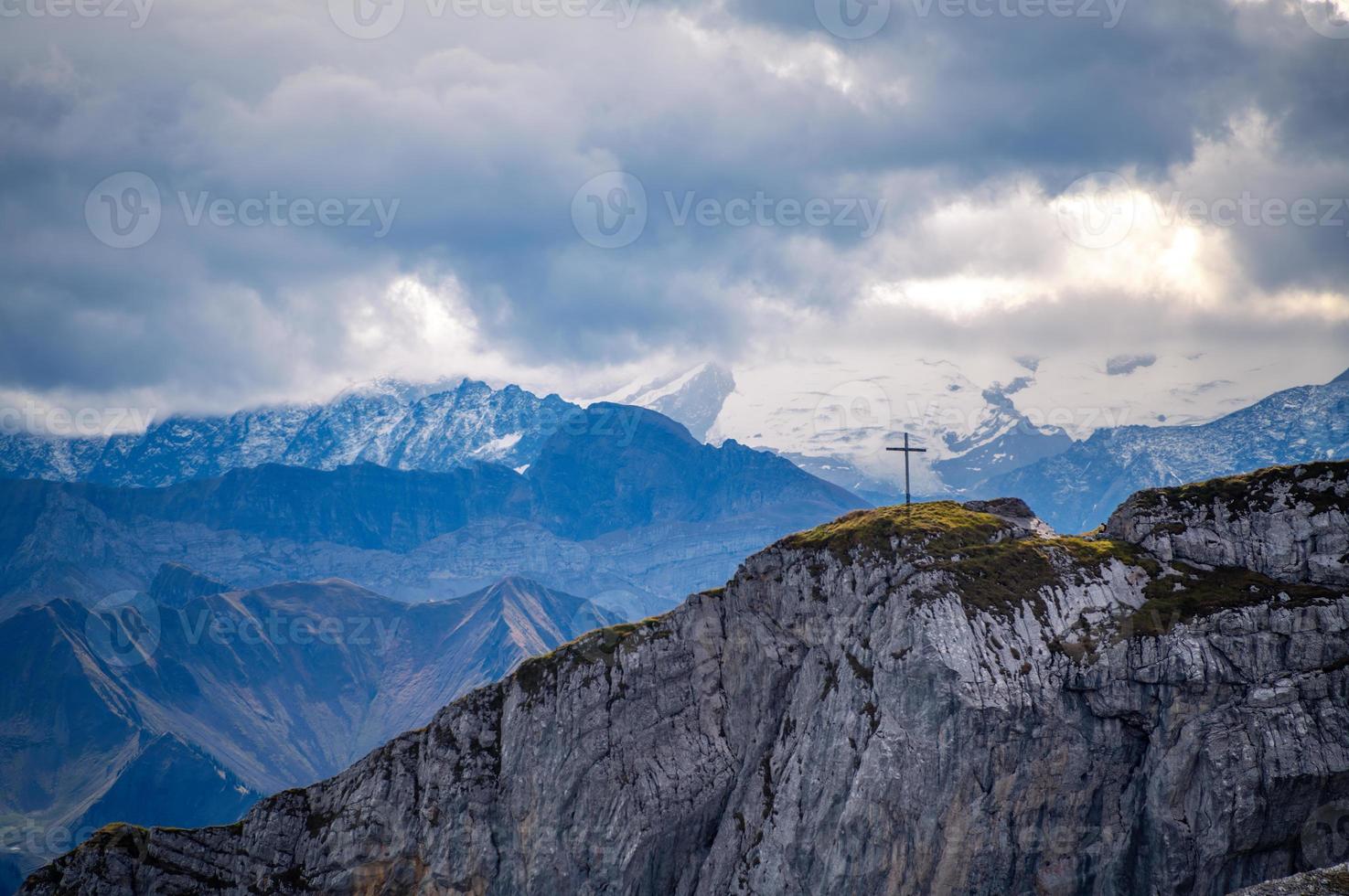 Mountain landscape under cloudy sky photo