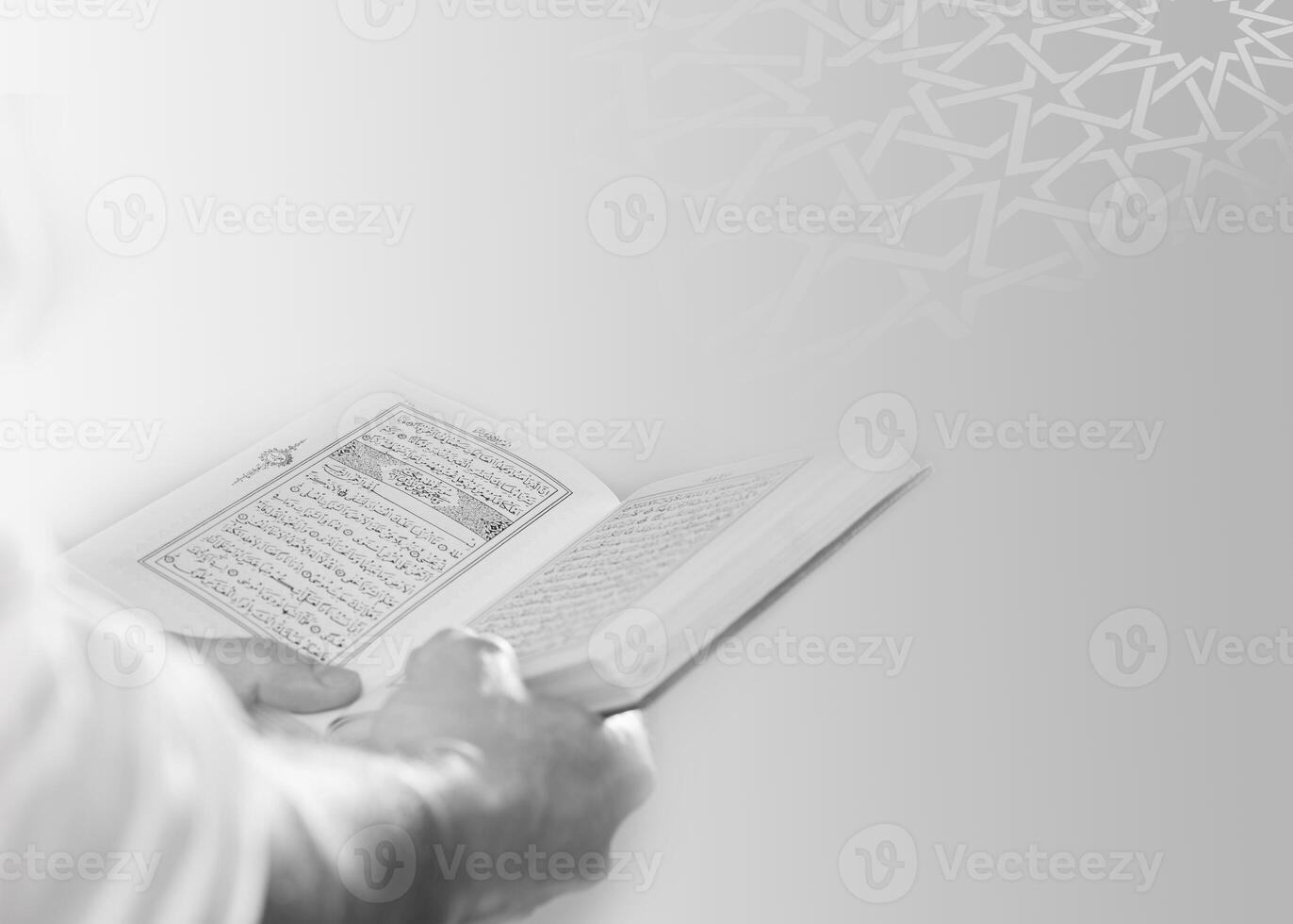 A man's hands are spread out in front of a white wall islamic ramadan kareem greeting background photo