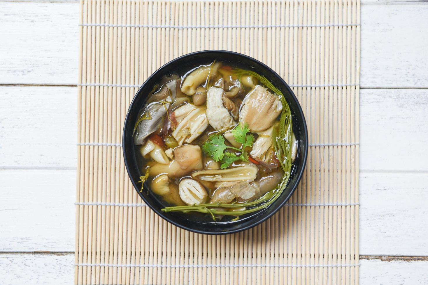 Mushroom soup bowl - Yellow wild mushroom or grisette Amanita hemibapha vaginata edible mushrooms cooked Asian food photo